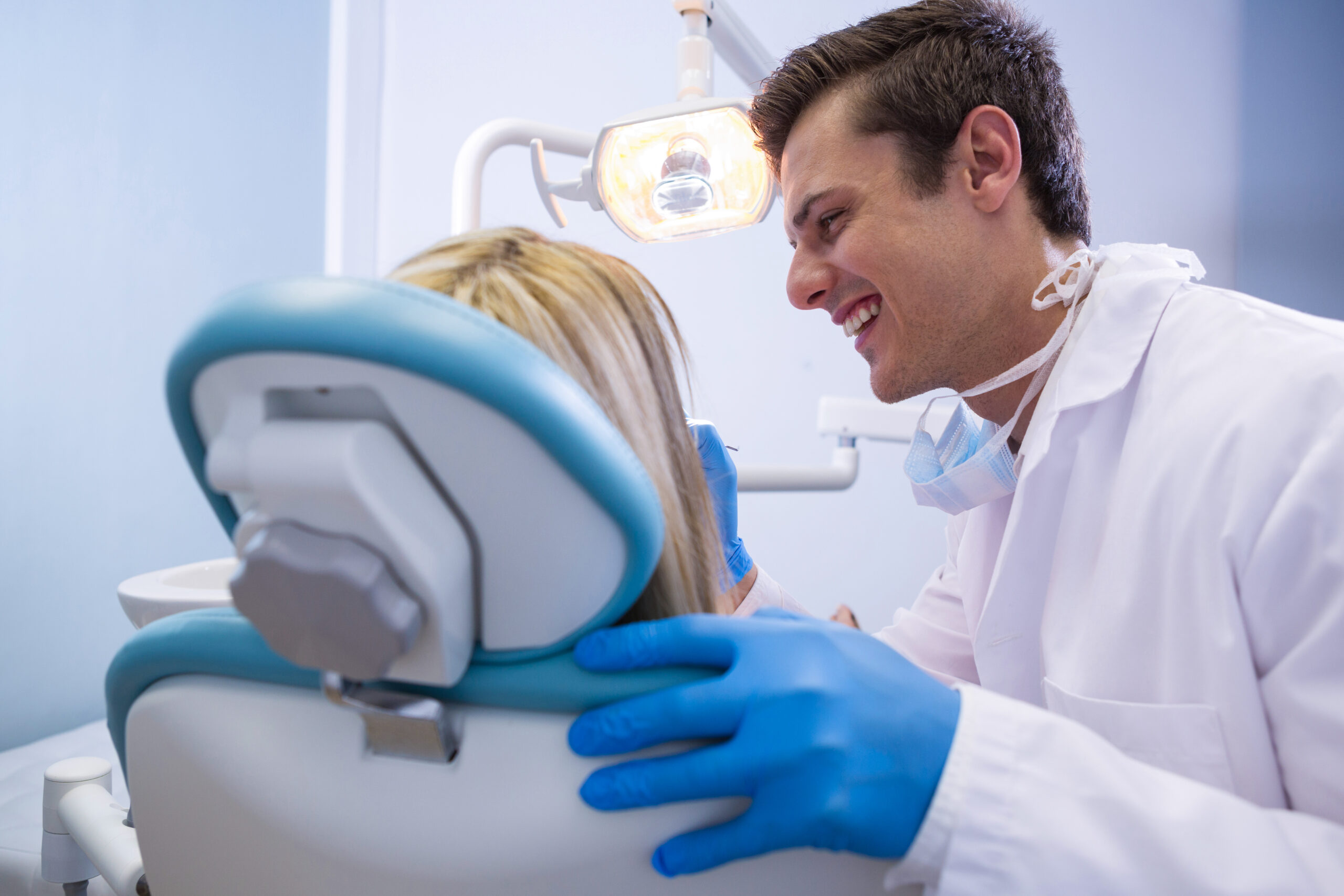 dentist-examining-woman-at-clinic-2025-04-03-21-25-33-utc